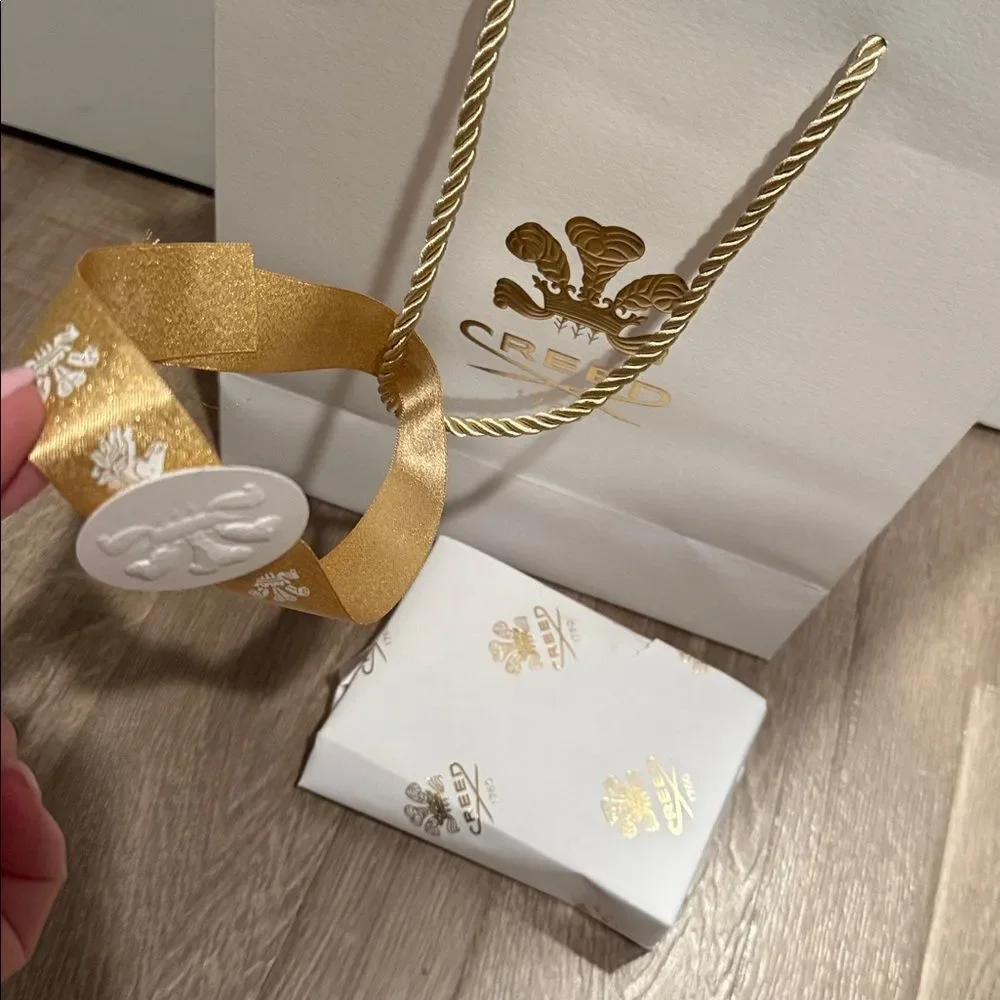 Creed Luxury White and Gold Bag with tissue paper